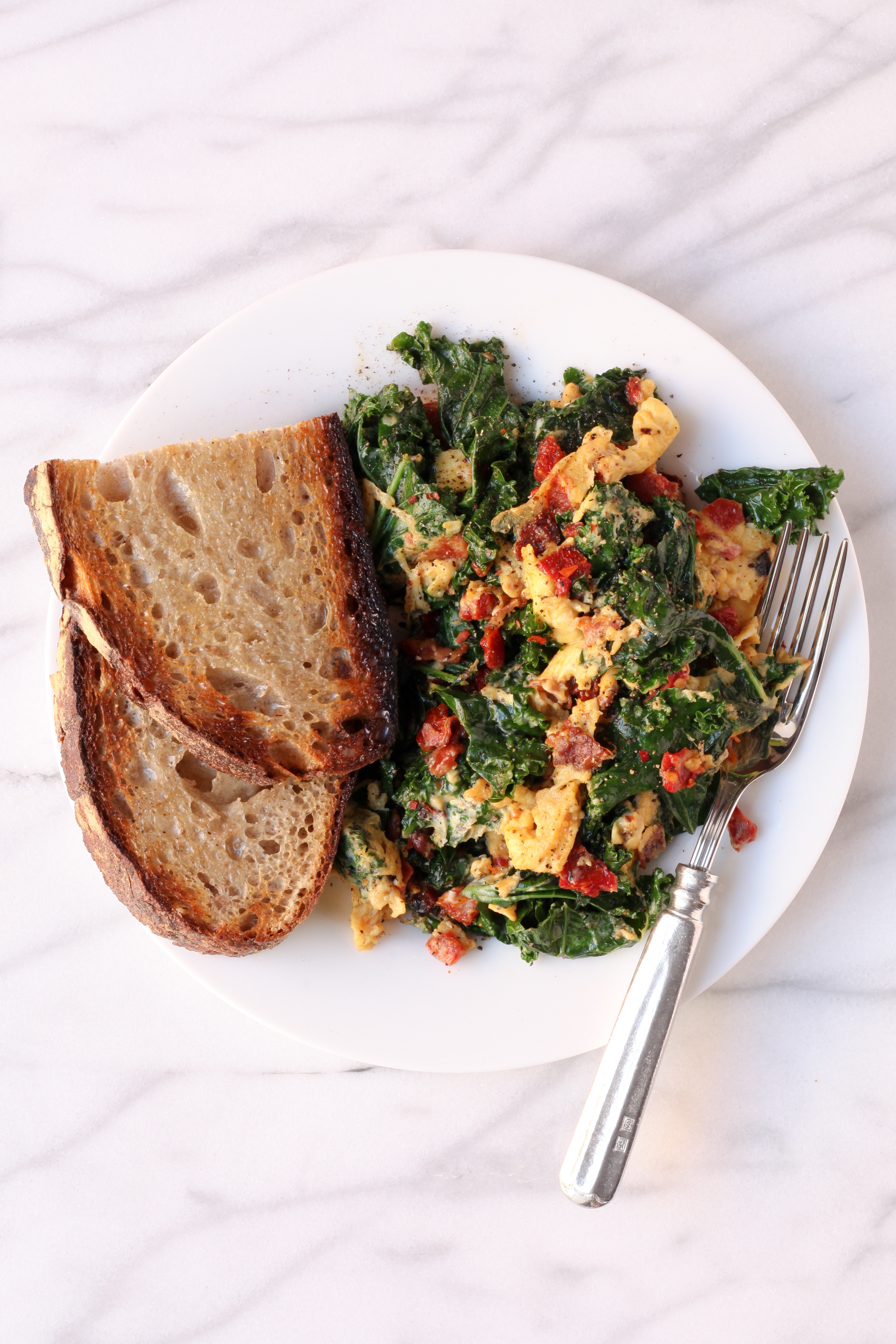 Kale, Pancetta, and Sundried Tomato Scramble | amodestfeast.com | @amodestfeast