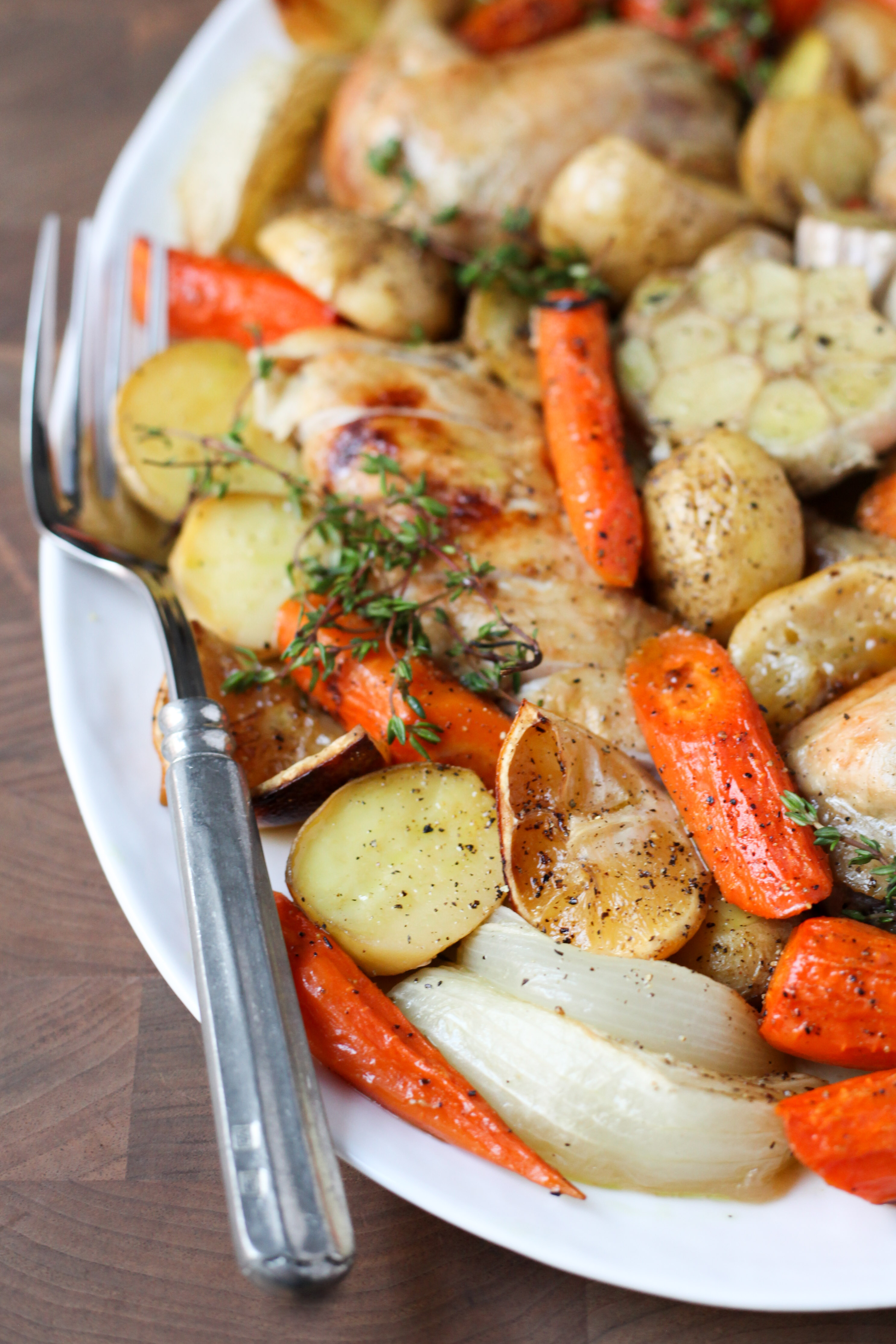 One-Pan Roast Chicken With Carrots, Onions, Potatoes, and Herbs | amodestfeast.com | @amodestfeast
