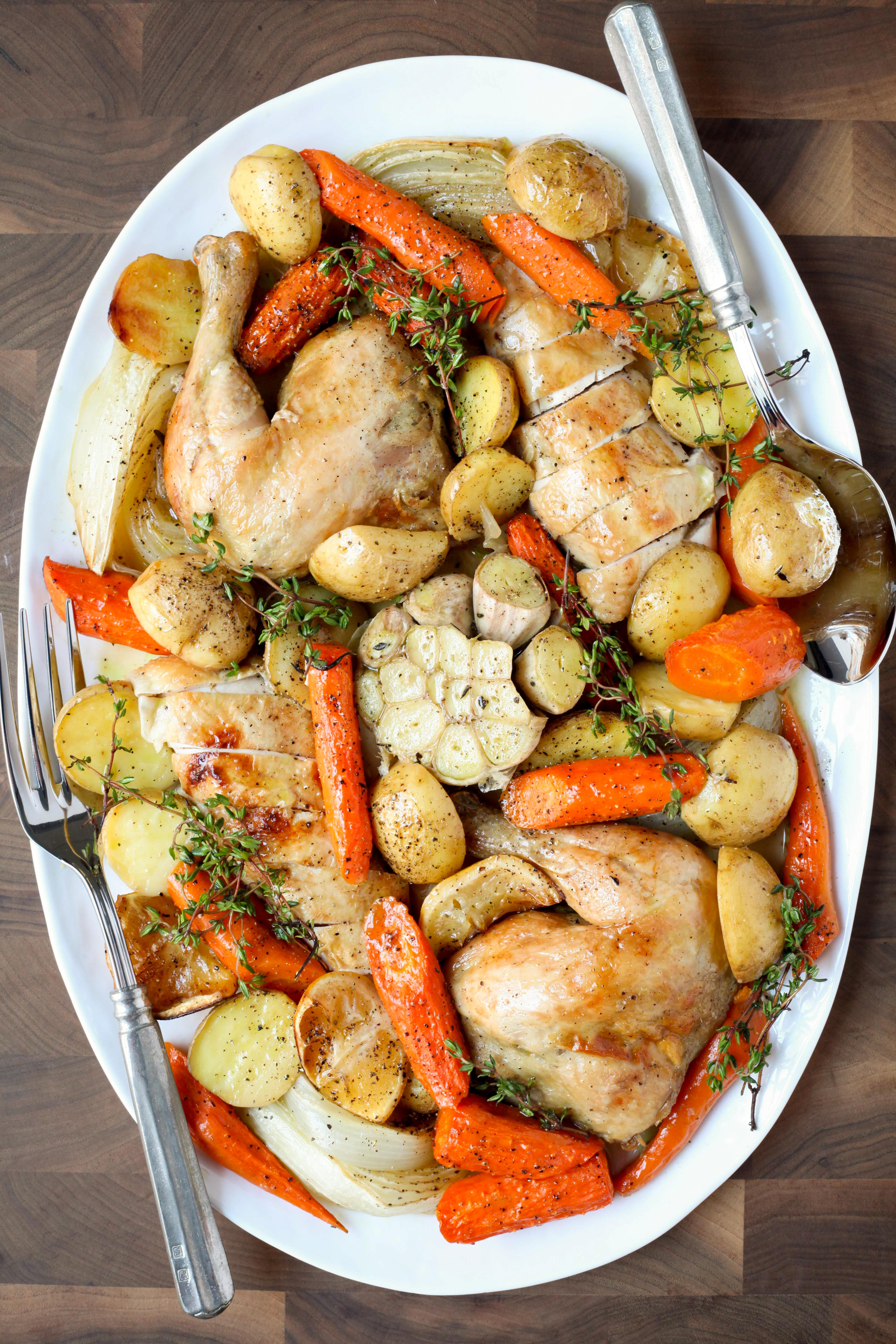 One-Pan Roast Chicken With Carrots, Onions, Potatoes, and Herbs | amodestfeast.com | @amodestfeast