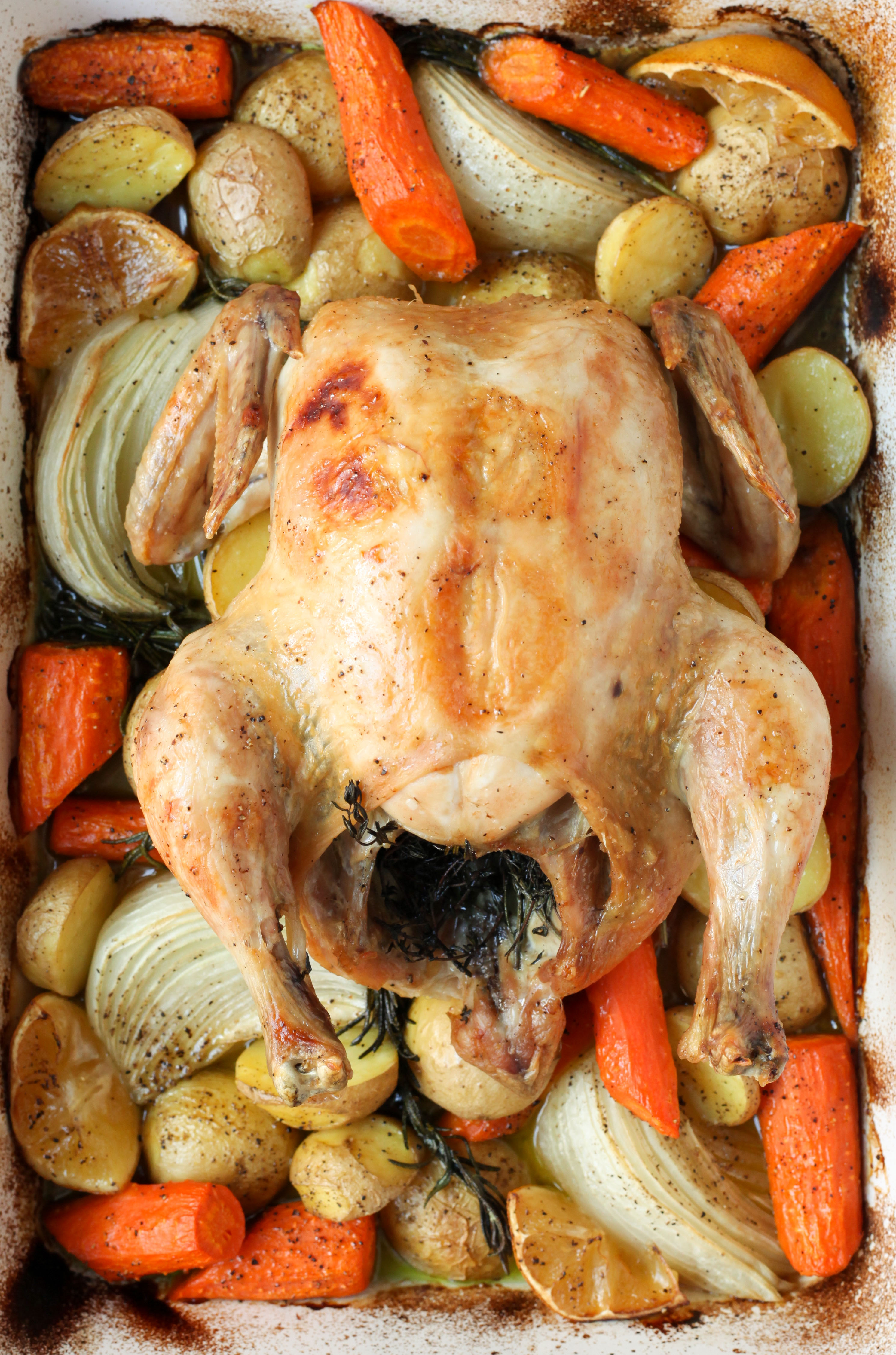 One-Pan Roast Chicken With Carrots, Onions, Potatoes, and Herbs | amodestfeast.com | @amodestfeast