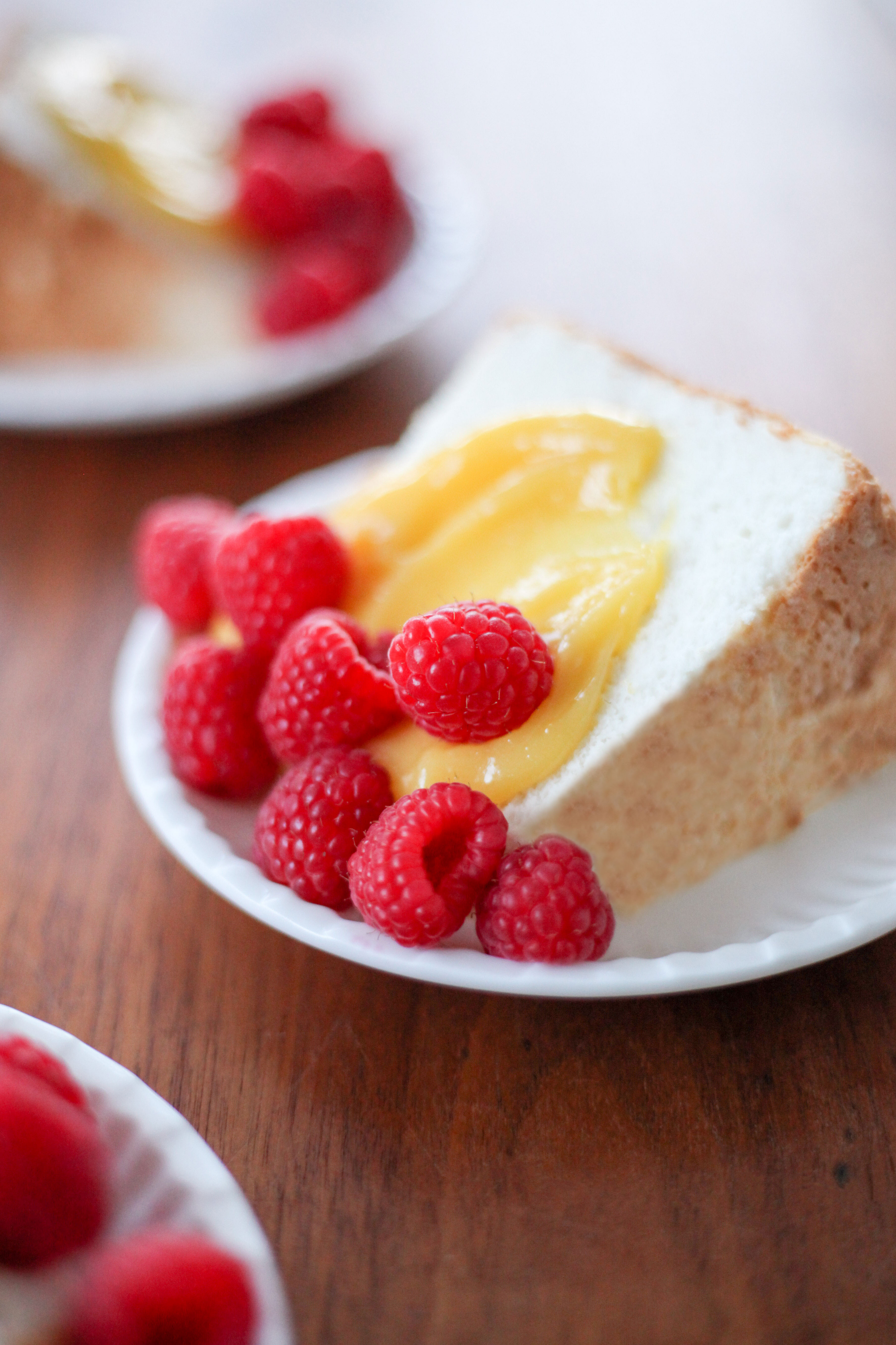 Angel Food Cake With Lemon Curd and Berries | amodestfeast.com | @amodestfeast