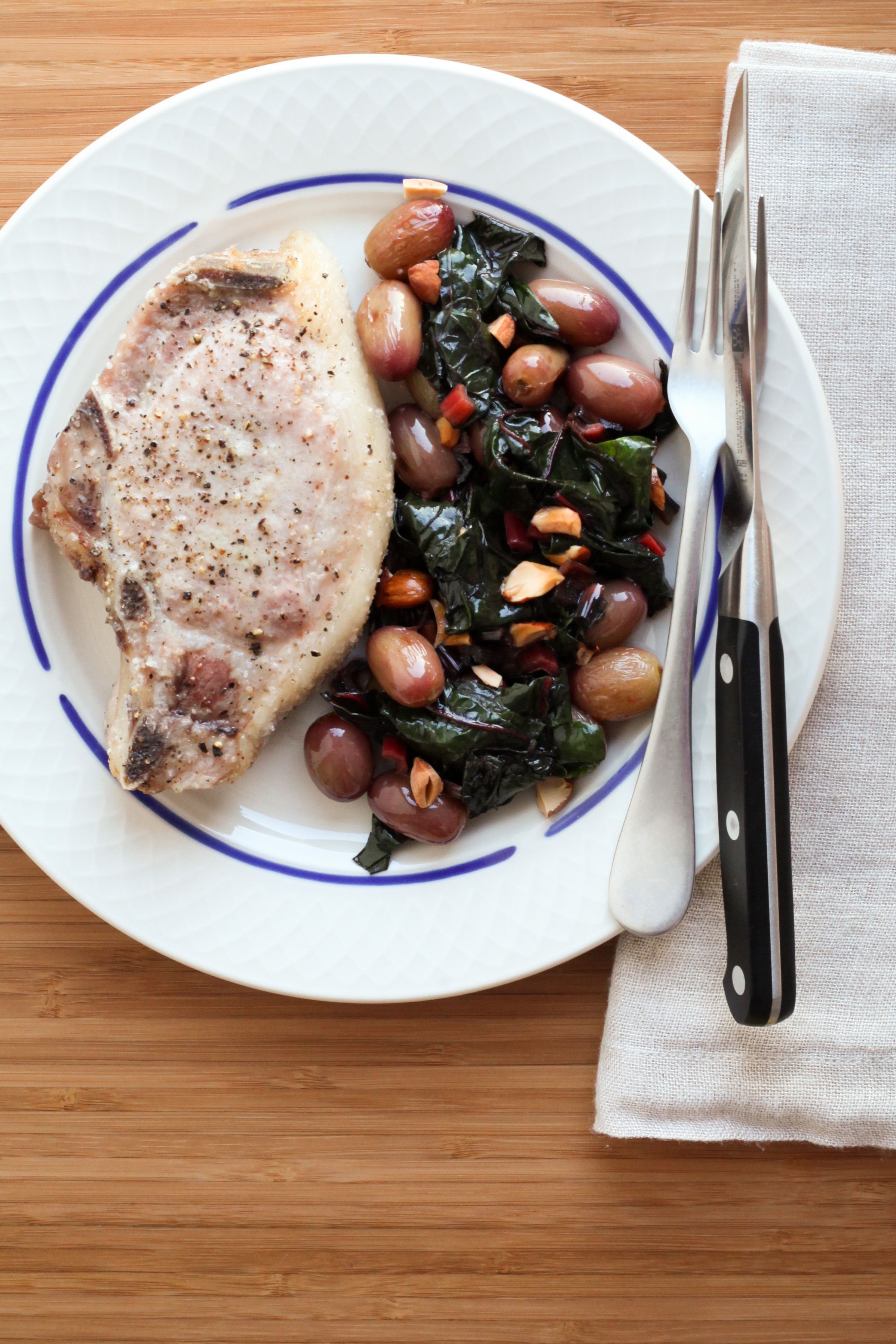 One-Pan Pork Chops With Grapes and Swiss Chard | amodestfeast.com | @amodestfeast