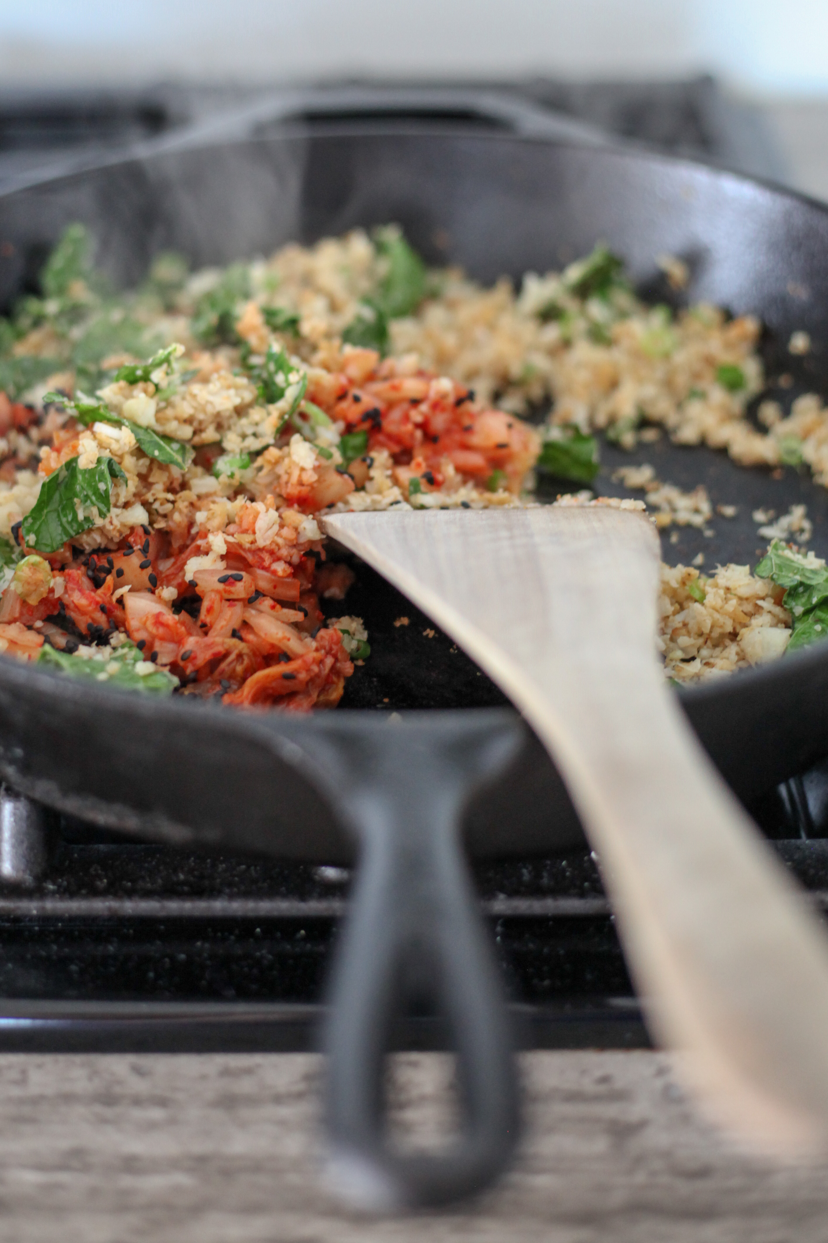 Adding the kimchi