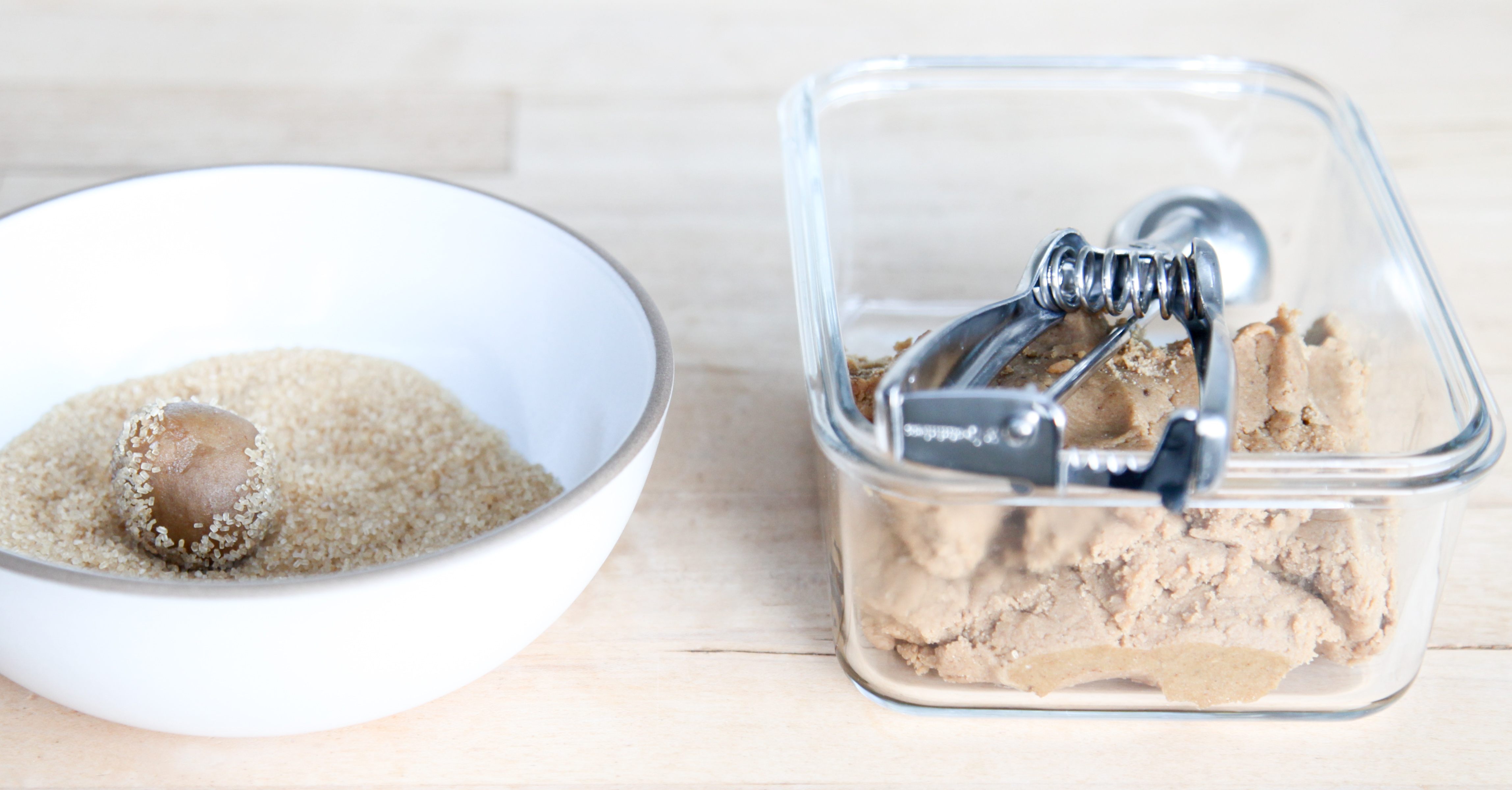 Rolling cookie dough in sugar